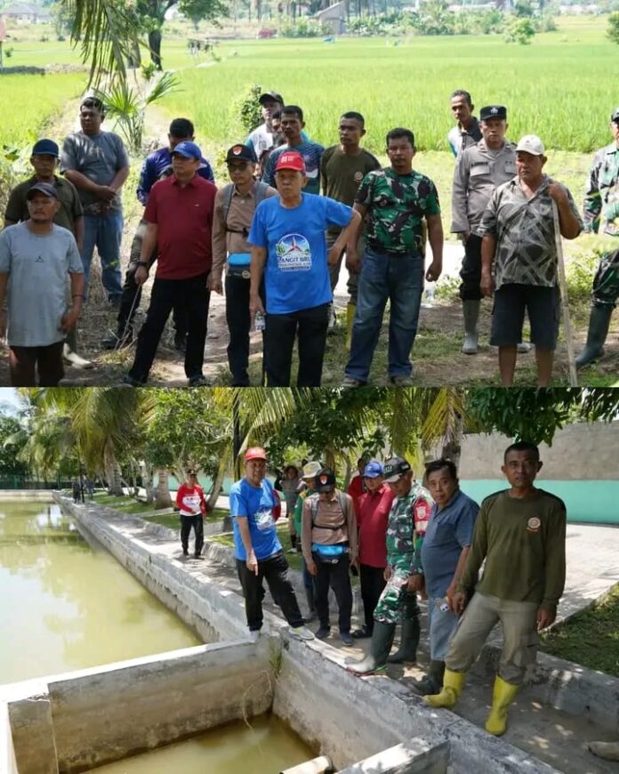Wakil Bupati Paluta H. Basri Harahap gotong royong membersihkan saluran irigasi Dugabe–Minang Mahimbau